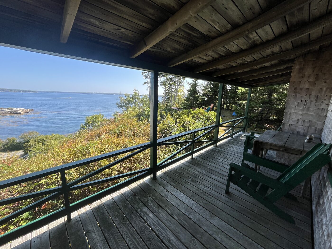 View of the water from the covered porch at Hillside Cottage